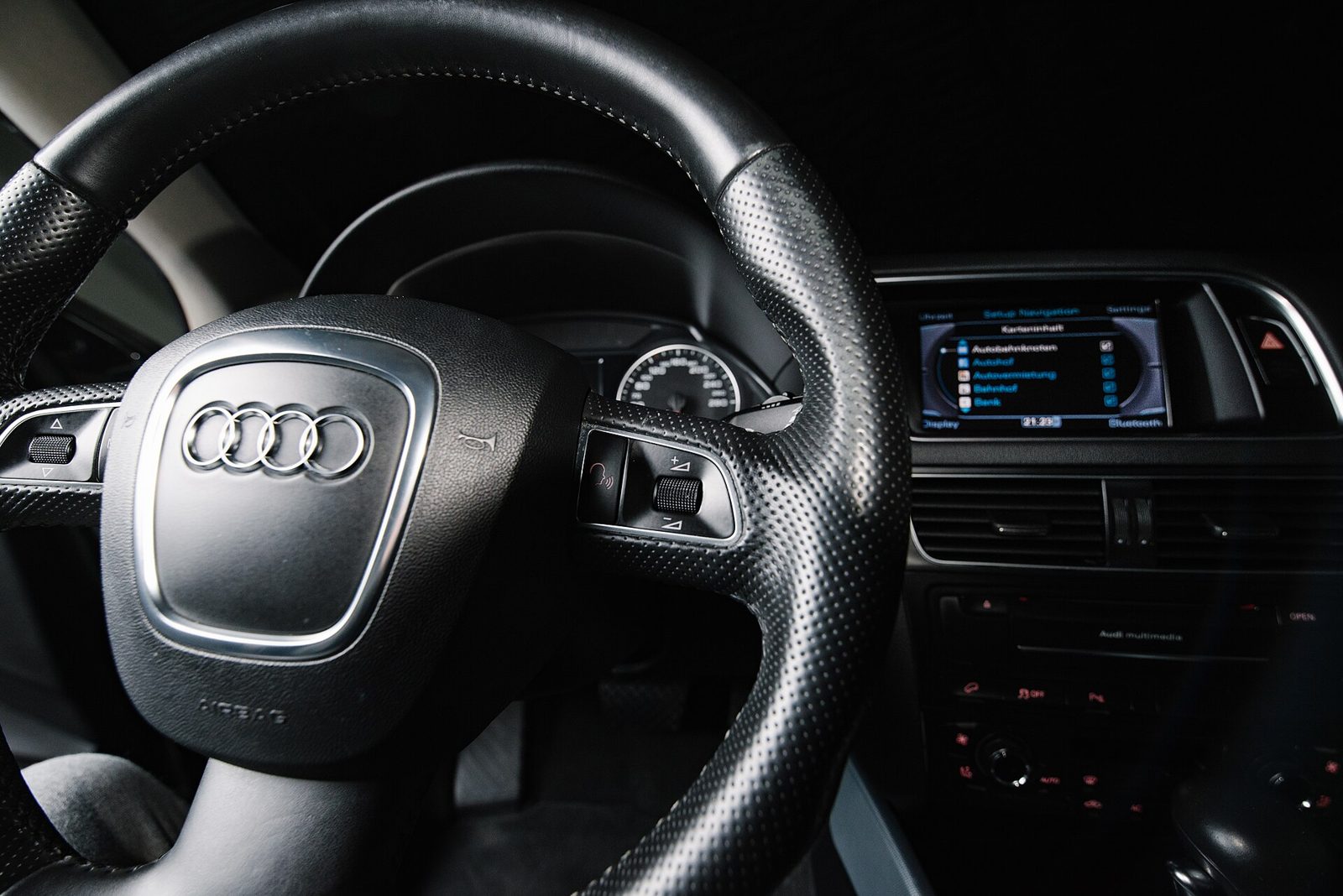 A steering wheel close-up inside a car