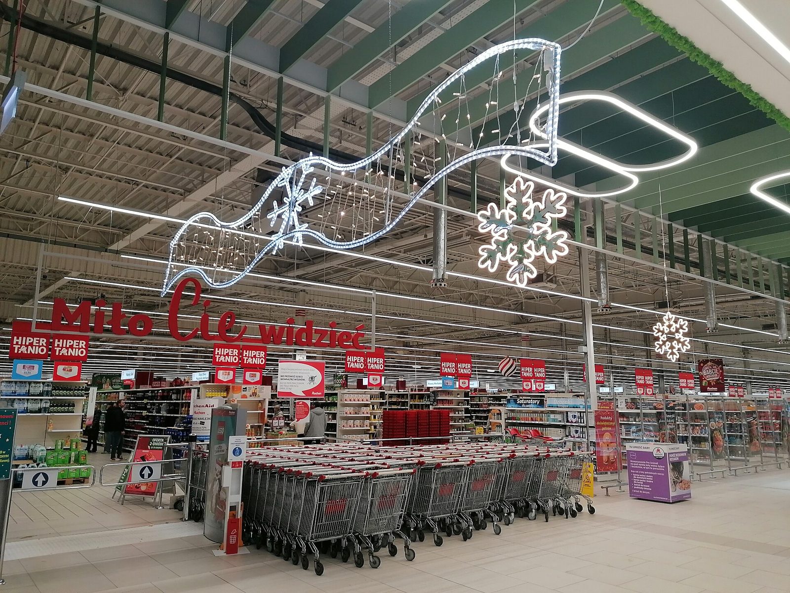 Shopping trolleys outside an Auchan store in Mikołów